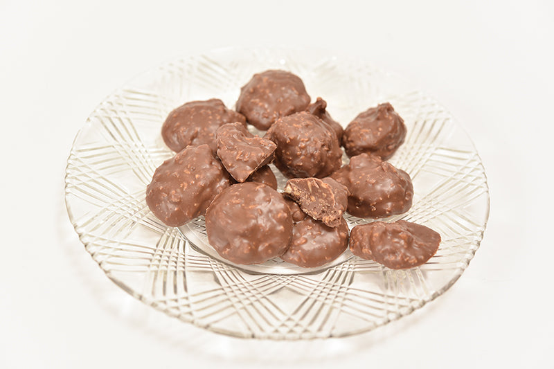 Milk Chocolate Coconut Nibs (Half Pound Box) - Conrad's Confectionery